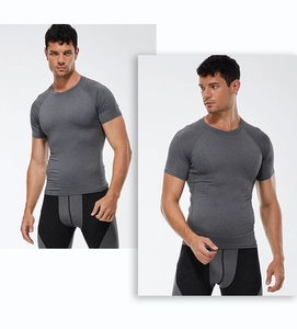 Front and side view of men's compression fitness set with grey tee and two-tone shorts