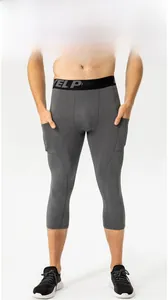 Detail of men's quick-dry compression capri pants with elastic EL PRO waistband and side pockets