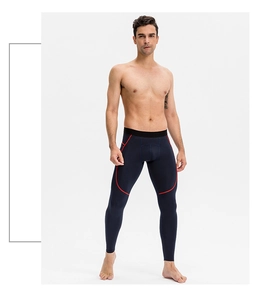 Vue détaillée du pantalon de compression pour homme avec coutures rouges et poche latérale