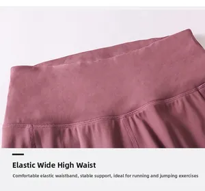 Détail macro de la large taille haute élastique sur le legging de yoga bordeaux