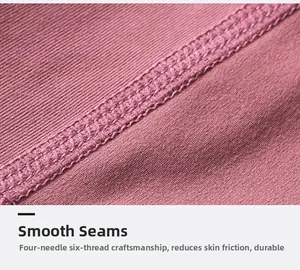 Détail macro du pantalon de yoga montrant le tissu élastique et les coutures plates