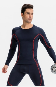 Detail of men compression fitness set with red stitching and ergonomic design