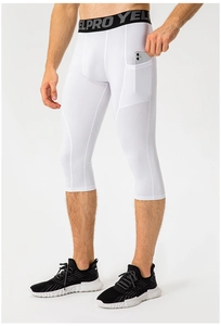 Close-up of men's white compression pants with side pocket for smartphone storage