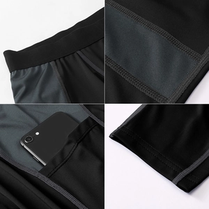 Detail showing elastic waistband, side pocket for phone, and reinforced seams on sports tights