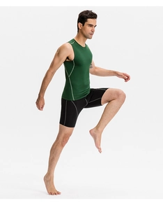 Men's green compression vest and black shorts with white stitching in a sports pose
