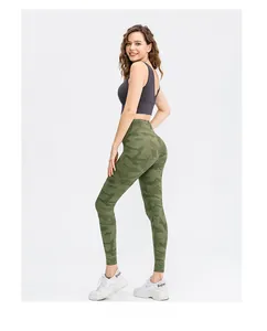 Detail of high-waist yoga leggings in green camo print with seamless back design