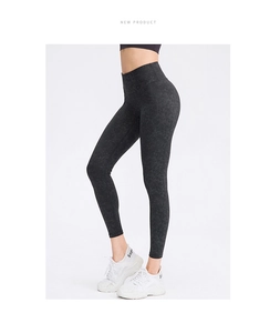 Side view of high-waist yoga leggings with dark grey textured print and slim fit cut