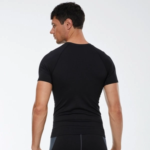 Back view of men's black quick-dry compression gym shirt with ergonomic raglan sleeves