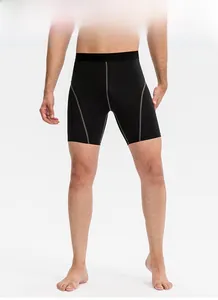 Détail du short de compression pour hommes avec coutures plates grises et taille élastique