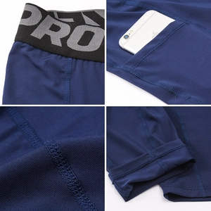 Men's blue gym tights details showing elastic waistband and side phone pocket feature