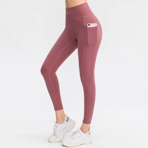 Leggings de yoga taille haute pour femmes avec poches latérales en rose poudré sport