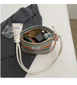 Interior view of colorful striped woven bucket bag showing large storage capacity