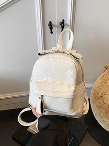 Chic off-white snakeskin mini backpack with front flap pocket and top handle for women