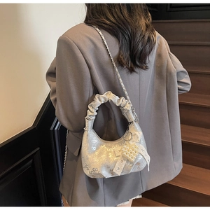 Silver crescent bag with pleated handle, chain strap and pearl heart charm detail