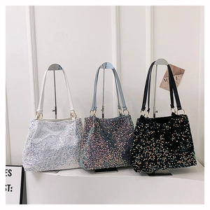 Detailed comparison of three sequin tote bags in pearl white, purple, and classic black