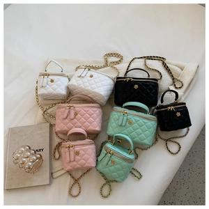 Quilted crossbody phone bags with camellia flower detail and chain straps in four colors