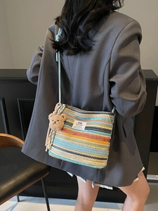 Colorful striped woven straw bucket bag with cute bear charm and shoulder strap