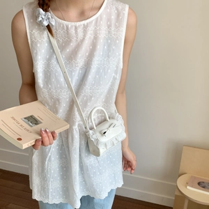White lace crossbody mini bag with bow detail and adjustable strap for elegant women