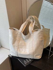 Chic beige canvas tote bag with KFR logo and large capacity for daily office commute