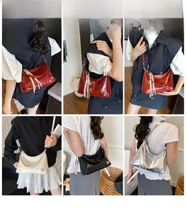 Collage of glossy moon-shaped shoulder bags in wine red, cream, black, and silver finishes