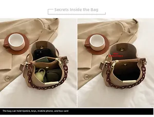 Détail de l'intérieur du sac seau kaki montrant les compartiments et la capacité de rangement