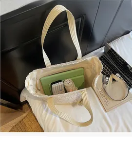 Top view of large capacity cream woven tote bag showing spacious fabric interior