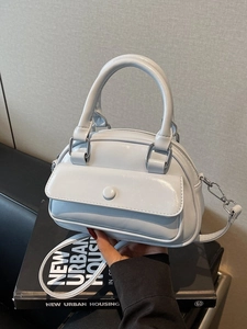 Minimalist light blue mini boston handbag with front pocket and detachable shoulder strap