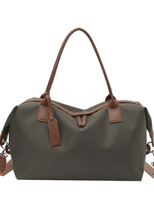 Olive green large capacity nylon tote bag with brown leather handles and brand tag