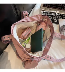 Internal view of pink tote bag showing large capacity for tablet and daily items