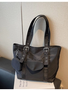 Chic black nylon tote bag with silver buckles and a small round coin purse