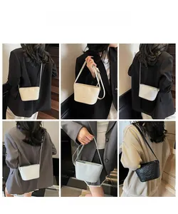 Detailed views of soft woven underarm bag showing crossbody and shoulder carrying styles