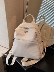 Chic beige textured backpack with large capacity and adjustable straps for women