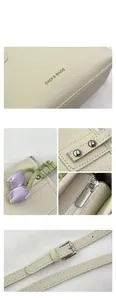 Close-up of creamy white bucket bag with lychee texture leather and tulip charm detail