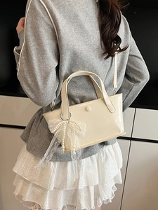 Borsa a secchiello crema chic da donna con ciondolo in pizzo e perle e doppia maniglia