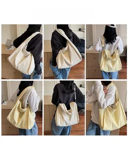 Detailed views of the large pleated canvas tote bag shown from multiple angles