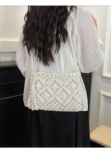 Handmade bohemian hollow knit white crossbody bag with geometric patterns and fringe