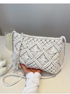 Chic hollow-out crochet cotton shoulder bag in cream white with fringe and tassel