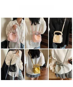 Detail showing woven handle and drawstring closure on various stylish bucket bags