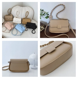 Detail of woven textured flap on faux leather crossbody bag with dual straps for women