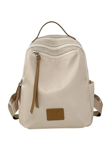 Minimalist beige waterproof nylon backpack with brown leather accents for women