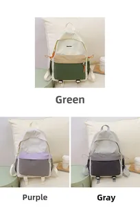 Close-up of three color options of nylon backpacks in green, purple, and grey finishes