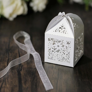 Detailed laser cut white floral gift box with pearl paper texture and organza ribbon