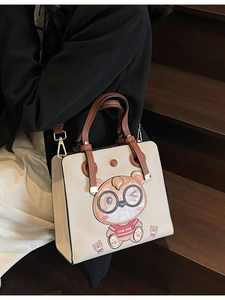Off-white and brown large tote bag with cute cartoon bear and wide shoulder strap