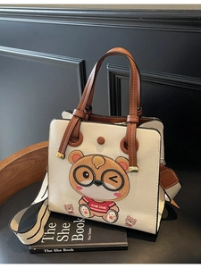 Large cream tote bag with cartoon bear embroidery and wide striped shoulder strap