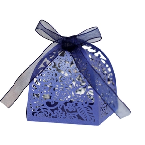 Navy blue laser cut wedding favor box with rose patterns and matching organza ribbon bow