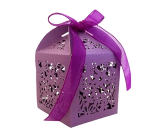 Detailed laser-cut floral pattern on purple gift box with elegant organza ribbon