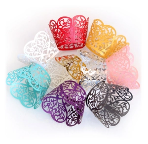 Detailed laser cut filigree cupcake wrappers in multiple vibrant metallic colors