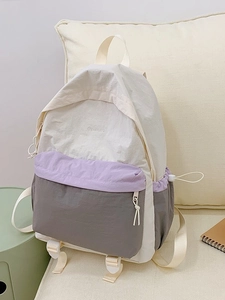 Three-color patchwork nylon backpack in cream, purple and grey for casual travel