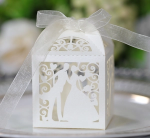 Detailed laser-cut wedding candy box featuring bride and groom silhouette and white ribbon