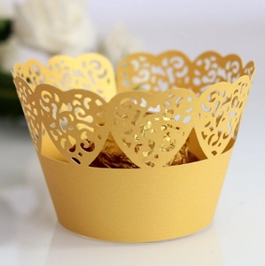 Golden laser-cut cupcake wrapper with heart pattern for wedding party decoration